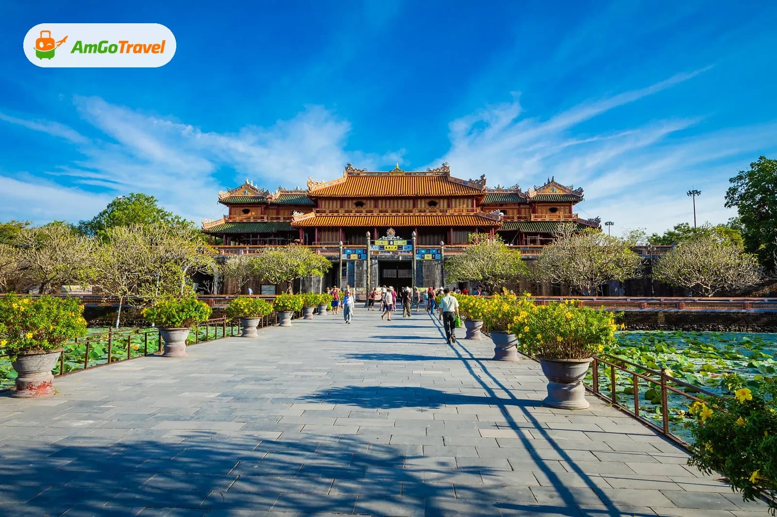 Hue Imperial City gate and lotus ponds under blue sky