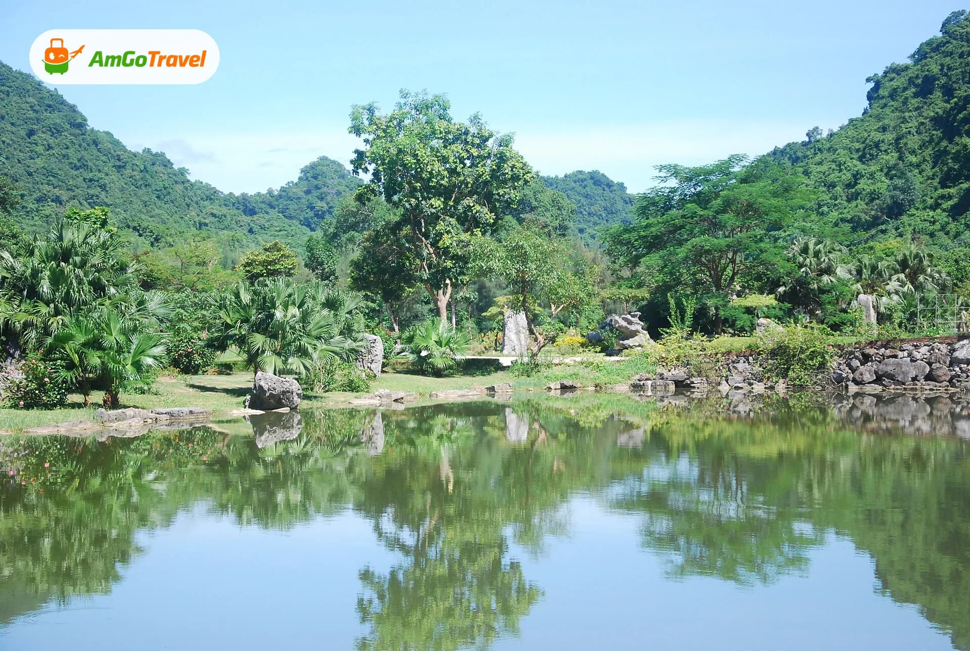 Calm lake reflecting the forest at Thung Nham, Ninh Binh