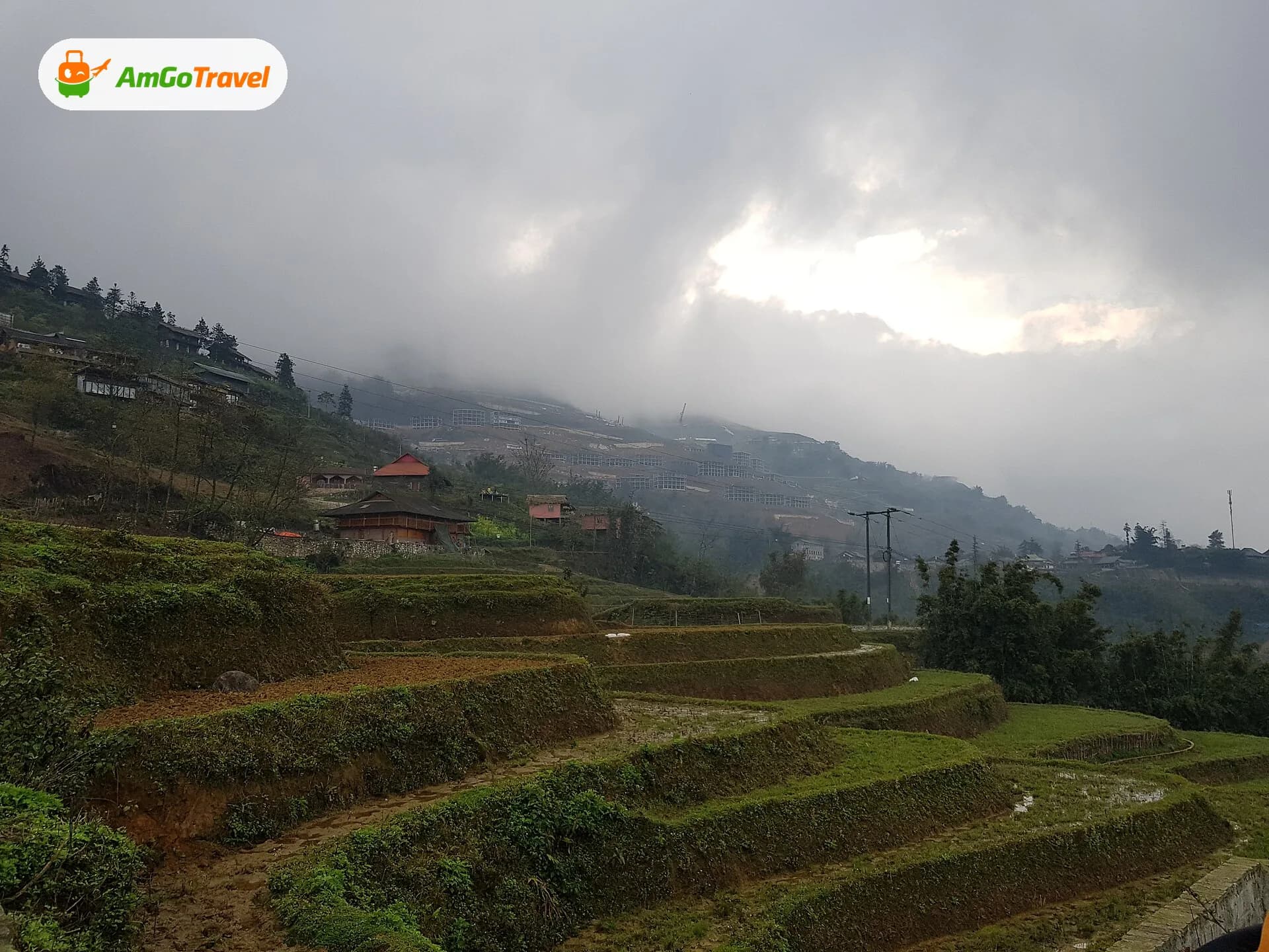 Terraced hillsides near Y Linh Ho village under low cloud