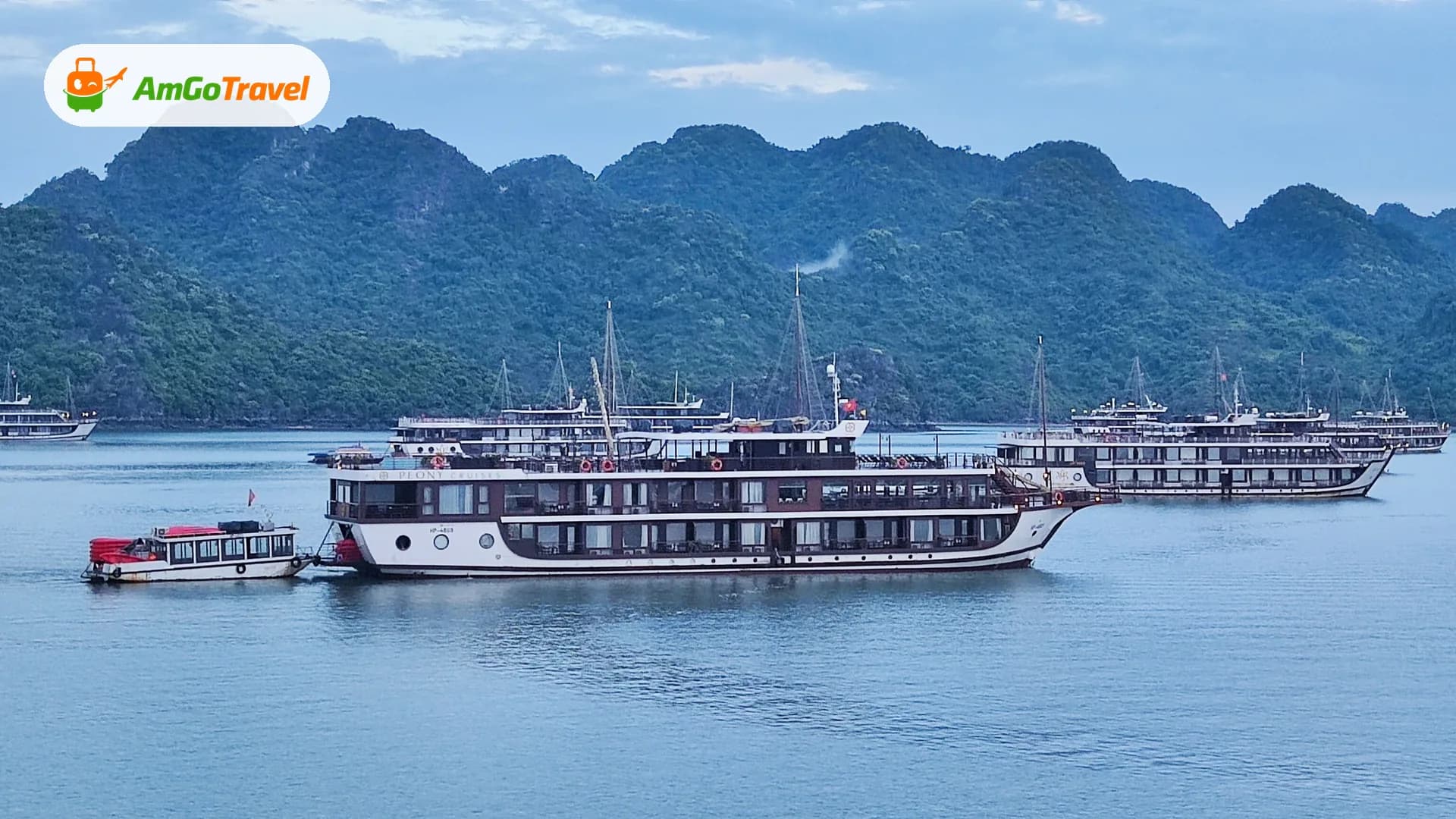 Cruise ships anchored among the limestone islands of Ha Long Bay