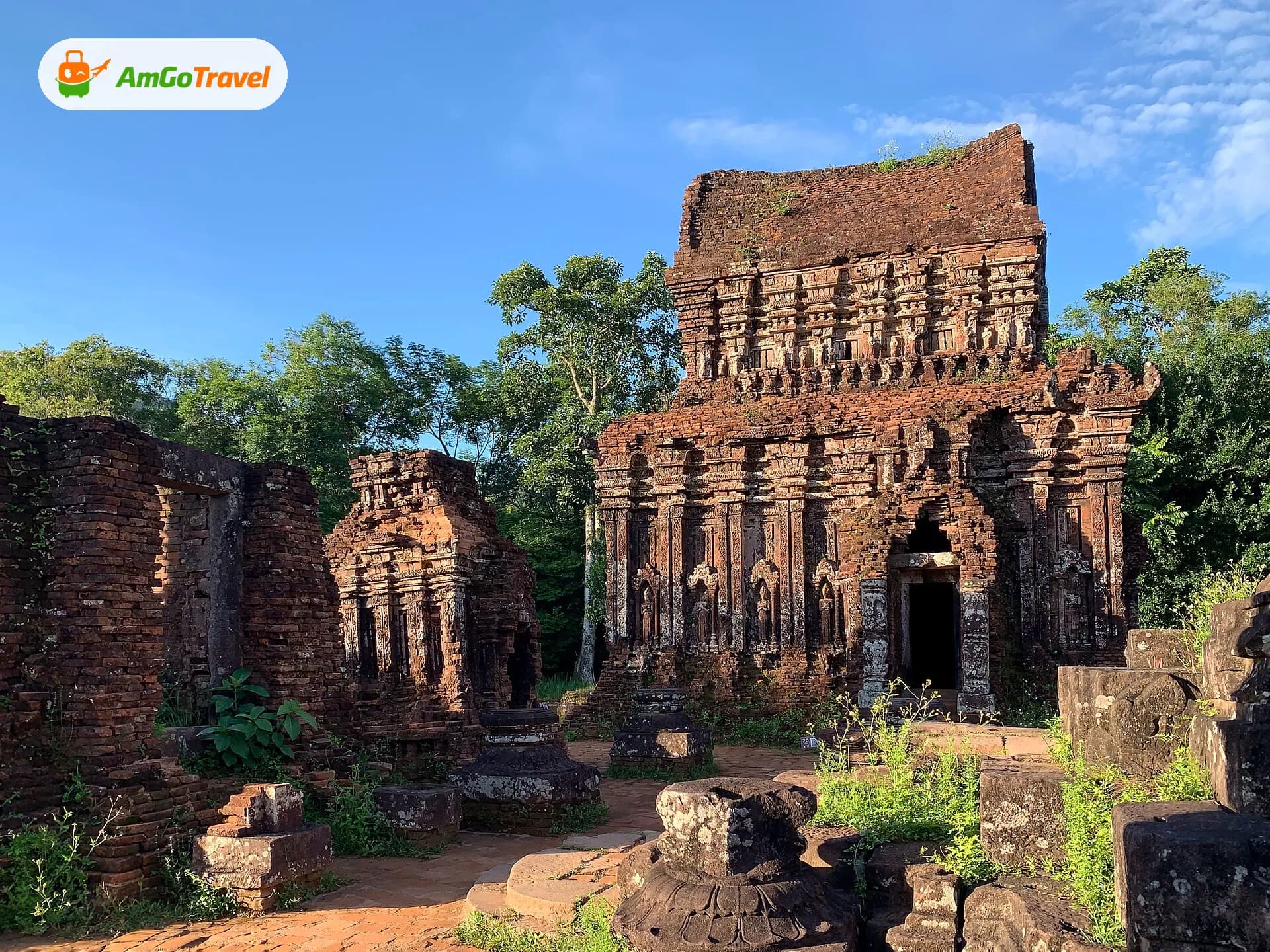 Carved Cham temple among ruins and jungle at My Son Sanctuary